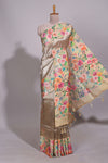 Brown geometric design tissue saree with contrast floral print border and printed blouse