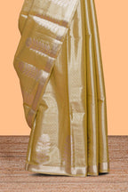 Mustard zari floral design tissue saree with self zari border and matching blouse