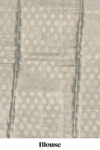 Steel blue zari floral design tissue saree with self zari border and matching blouse