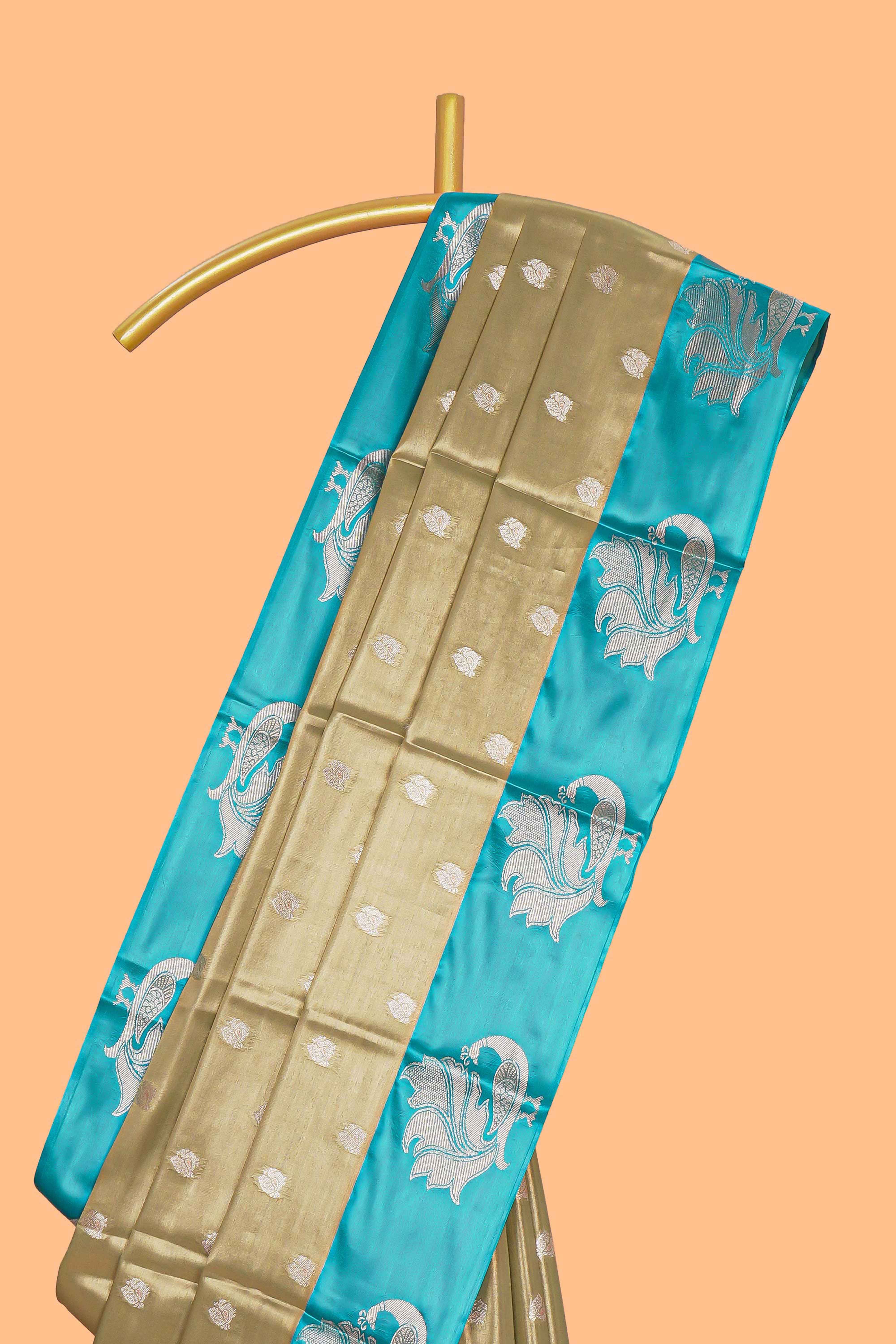 Mustard zari motifs design tissue saree with contrast peacock zari border and motifs blouse