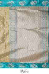 Mustard zari motifs design tissue saree with contrast peacock zari border and motifs blouse