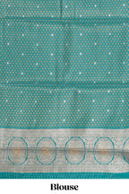 Mustard zari motifs design tissue saree with contrast peacock zari border and motifs blouse