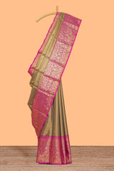 Mustard plain design tissue saree with contrast zari border and blouse