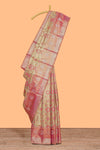Gold floral design tissue saree with contrast zari border and motifs blouse