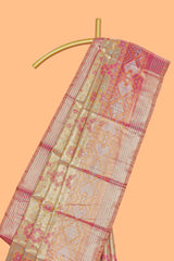Gold floral design tissue saree with contrast zari border and motifs blouse