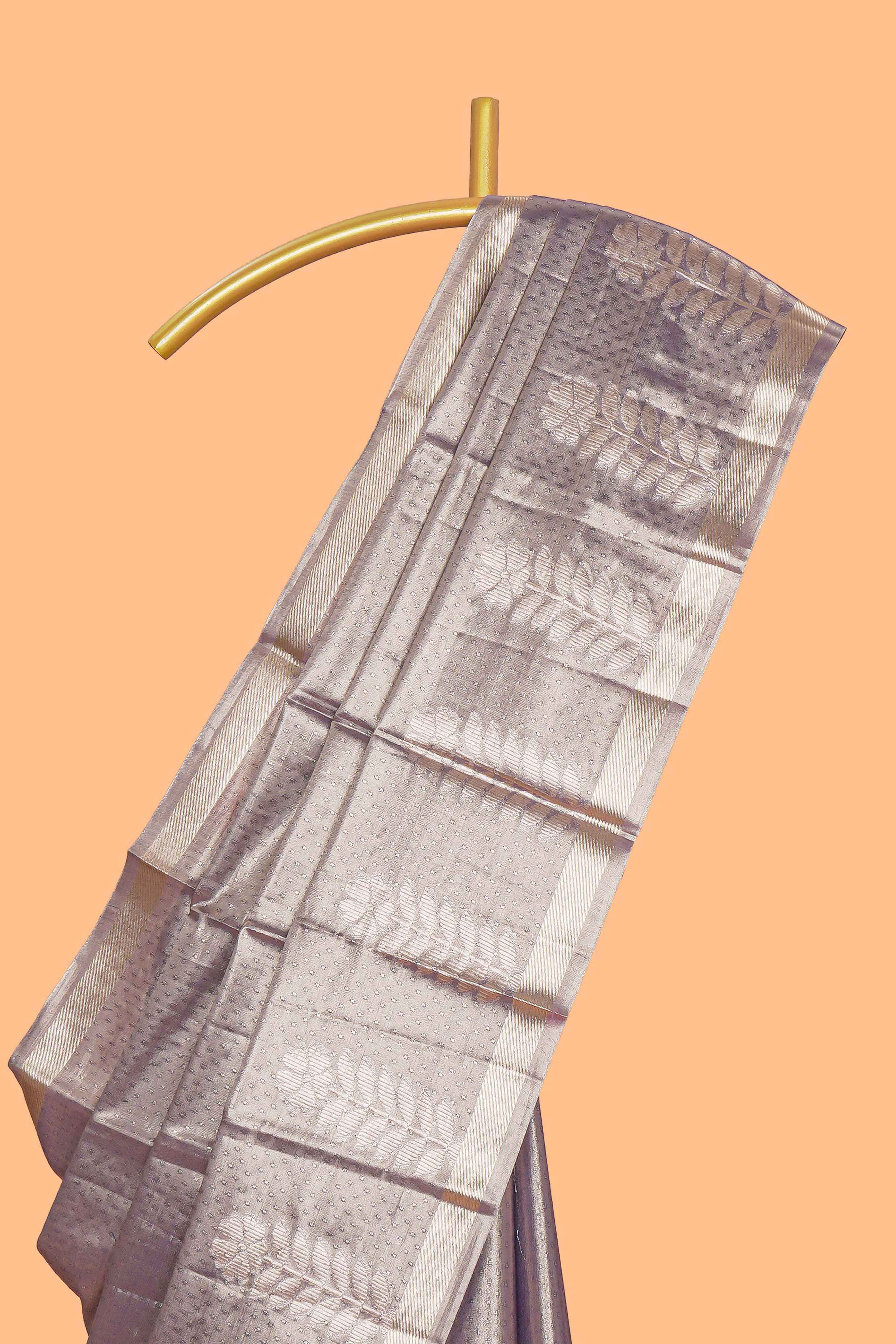 Grey floral design tissue saree with self zari border and matching blouse