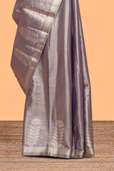Grey floral design tissue saree with self zari border and matching blouse