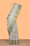 Grey zari motifs design tissue saree with contrast zari border and zari blouse