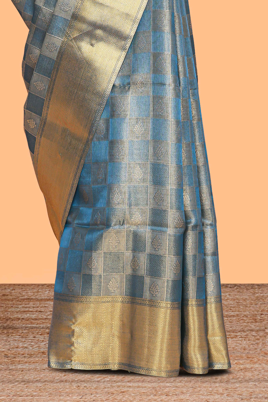 Blue checked zari motifs art tissue saree with self zari border and matching blouse
