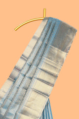 Blue geometric zari motifs art tissue saree with self zari border and matching blouse