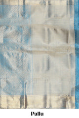 Blue geometric zari motifs art tissue saree with self zari border and matching blouse