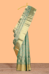 Green checked zari motifs art tissue saree with self zari border and matching blouse