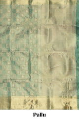 Green checked zari motifs art tissue saree with self zari border and matching blouse