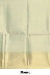 Green checked zari motifs art tissue saree with self zari border and matching blouse