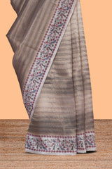 Grey striped art tissue saree with contrast floral & peacock design border and matching blouse