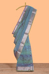 Blue crush art tissue saree with self design border and contrast zari blouse