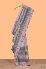 Grey striped art tissue saree with contrast floral design border and matching blouse