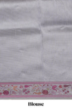 Grey striped art tissue saree with contrast floral design border and matching blouse