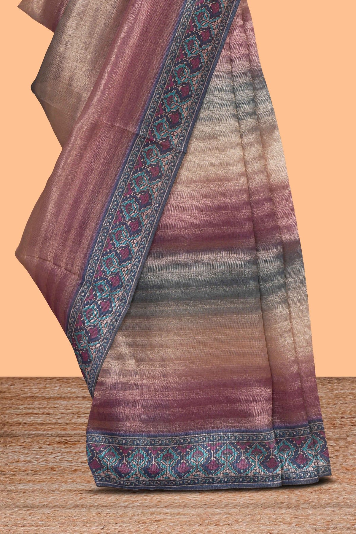 Multi color striped art tissue saree with contrast border and plain blouse