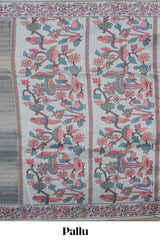Multi color striped art tissue saree with contrast border and plain blouse