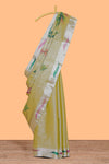 Green peacock feather design tissue saree with self zari border and contrast blouse