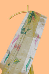 Green peacock feather design tissue saree with self zari border and contrast blouse