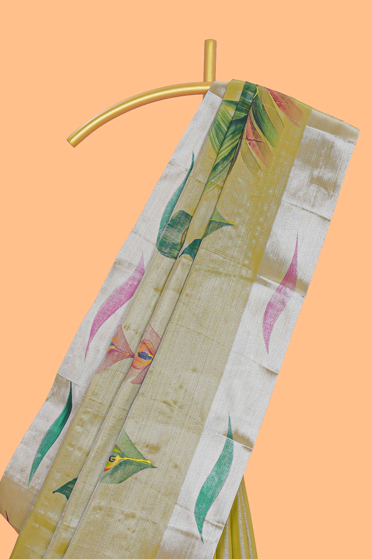 Green peacock feather design tissue saree with self zari border and contrast blouse