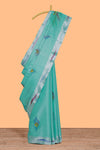 Teal green peacock feather design tissue saree with self zari border and contrast blouse