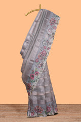 Grey striped design crush tissue saree with contrast floral border and matching blouse