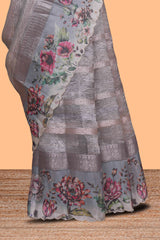 Grey striped design crush tissue saree with contrast floral border and matching blouse