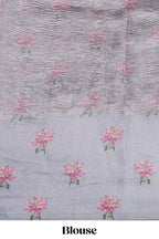 Grey striped design crush tissue saree with contrast floral border and matching blouse