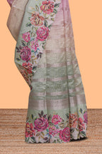 Green striped design crush tissue saree with contrast floral border and matching blouse