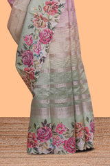 Green striped design crush tissue saree with contrast floral border and matching blouse