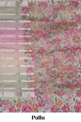 Green striped design crush tissue saree with contrast floral border and matching blouse