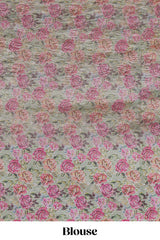 Green striped design crush tissue saree with contrast floral border and matching blouse
