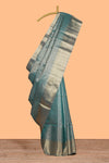 Teal blue geometric zari design art tissue saree with self zari border and matching blouse
