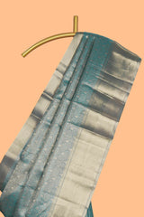 Teal blue geometric zari design art tissue saree with self zari border and matching blouse
