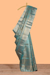 Teal blue floral vine zari design art tissue saree with self zari border and contrast blouse