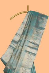 Teal blue floral vine zari design art tissue saree with self zari border and contrast blouse