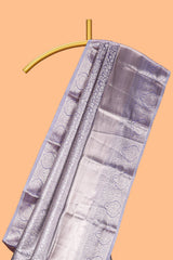 Lavender silver zari floral design art tissue saree with self zari border and matching blouse