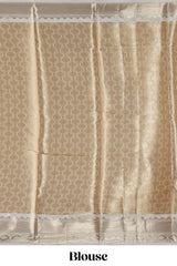 Sea green zari motifs design art tissue saree with contrast zari border and blouse