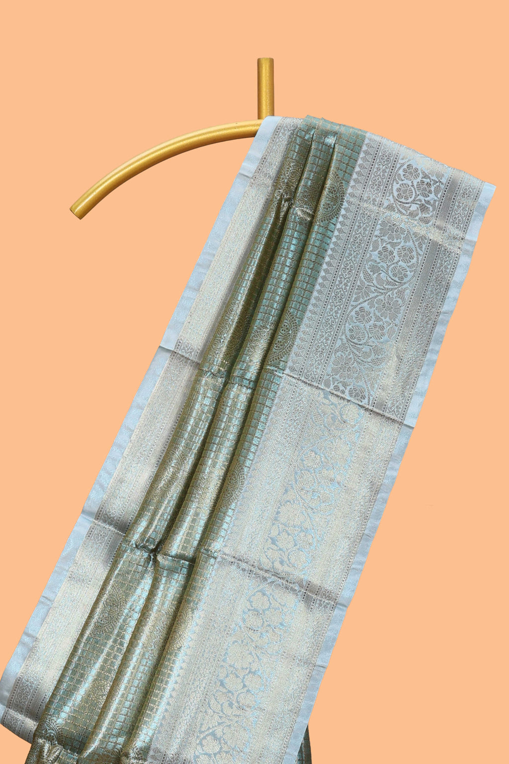 Blue checked zari motifs design art tissue saree with Self zari border and contrast blouse