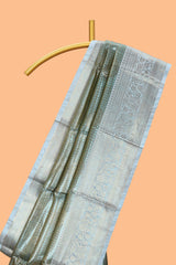 Blue checked zari motifs design art tissue saree with Self zari border and contrast blouse
