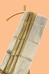 Golden zari checked motifs design art tissue saree with contrast zari border and matching blouse