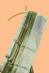 Green checked zari motifs design art tissue saree with self zari border and contrast motifs blouse
