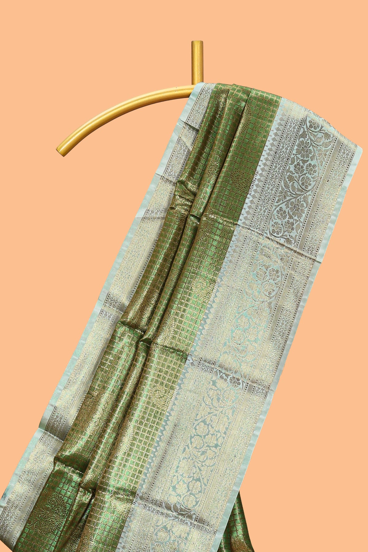 Green checked zari motifs design art tissue saree with self zari border and contrast motifs blouse