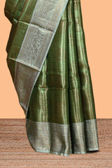 Green checked zari motifs design art tissue saree with self zari border and contrast motifs blouse