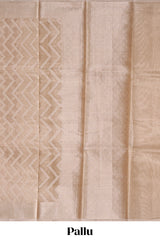 Beige chevron design art tissue saree with self zari border and matching printed blouse