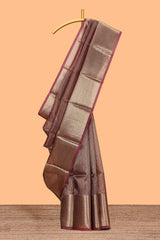 Dark maroon unique zari design art tissue saree with self zari border and matching blouse