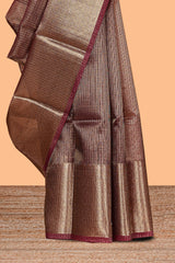 Dark maroon unique zari design art tissue saree with self zari border and matching blouse
